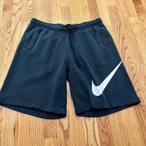 Nike Men's Black Athletic Shorts with White Swoosh